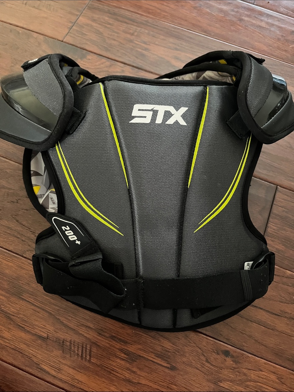 STX Youth Chest Protector in Charcoal with Neon Yellow Accents
